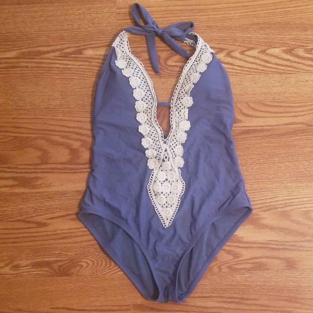 Low cut one piece bathing suit